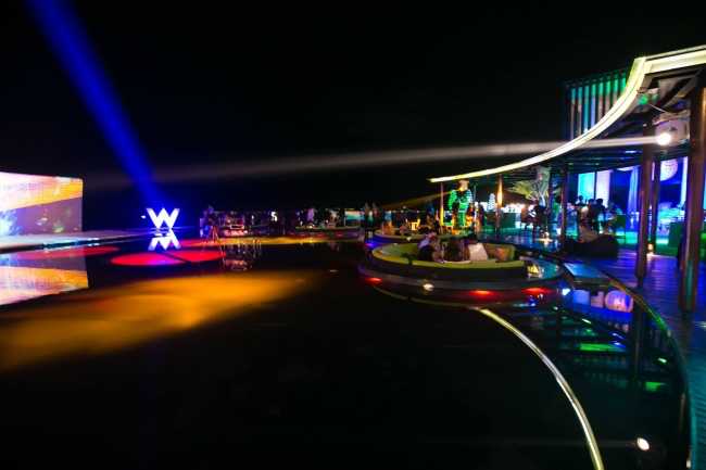 Vichai directs the sound at WooBar